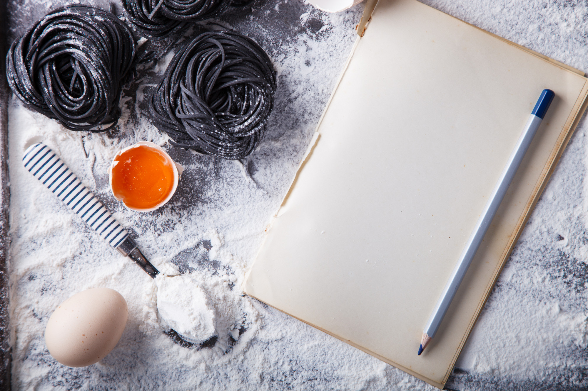 Pricing mood: notebooks, pen and recipe sketches